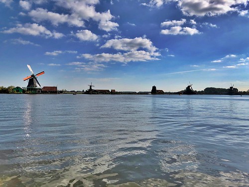 zaanse schans holland windmills nature river reflection netherlands landscape view amazing place europe european trip travel fun friends sky weather blue clouds green grass beautiful natural sight sightseeing panorama panoramic