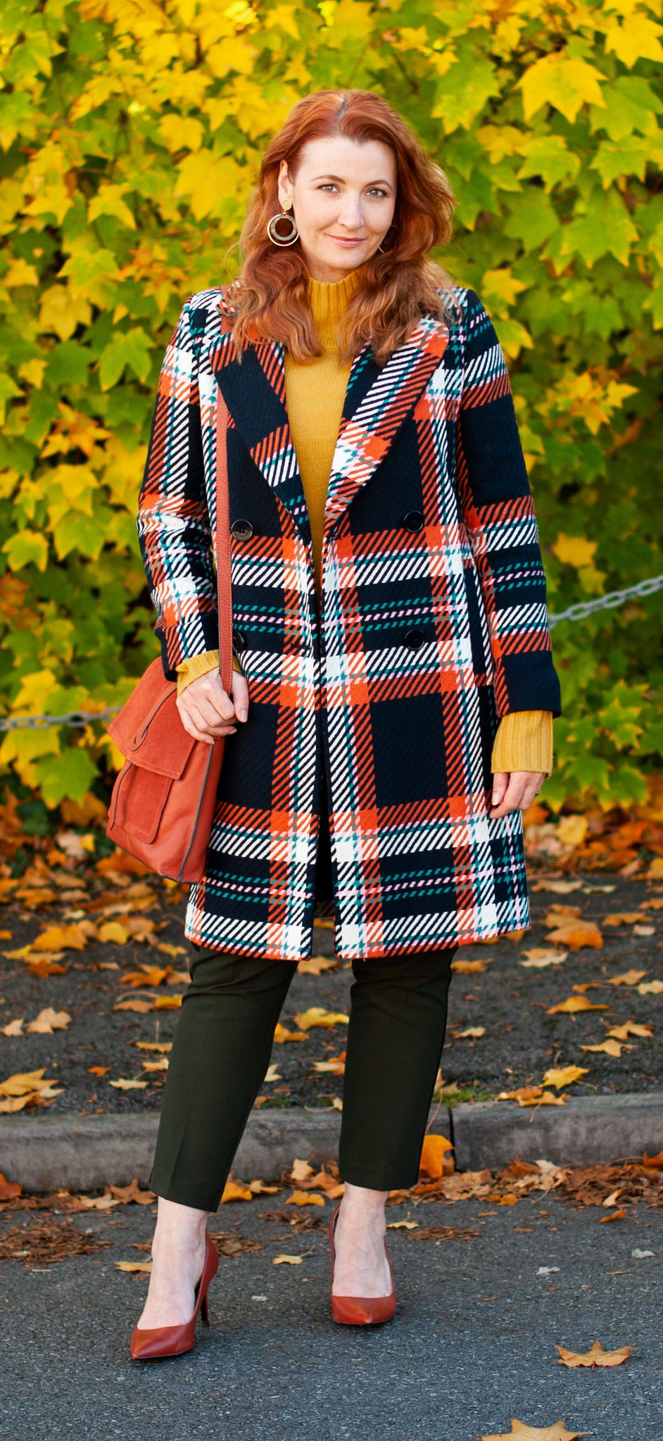 Dressing in Bold, Saturated Autumnal Colours \ check statement coat \ bottle green trousers \ burnt orange heels \ burnt orange suede messenger bag \ mustard yellow sweater | Not Dressed As Lamb, over 40 style