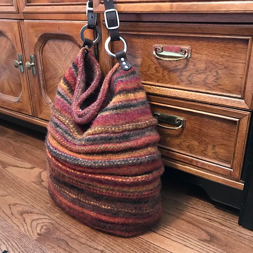 My finished and felted Bedouin Bag by Nora J Bellows knit with Noro Kureyon Air, hardware by Jul Designs