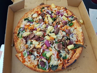 Vegerama pizza with vegan cheese, pineapple, and olives (minus feta and capsicum) from Dominos