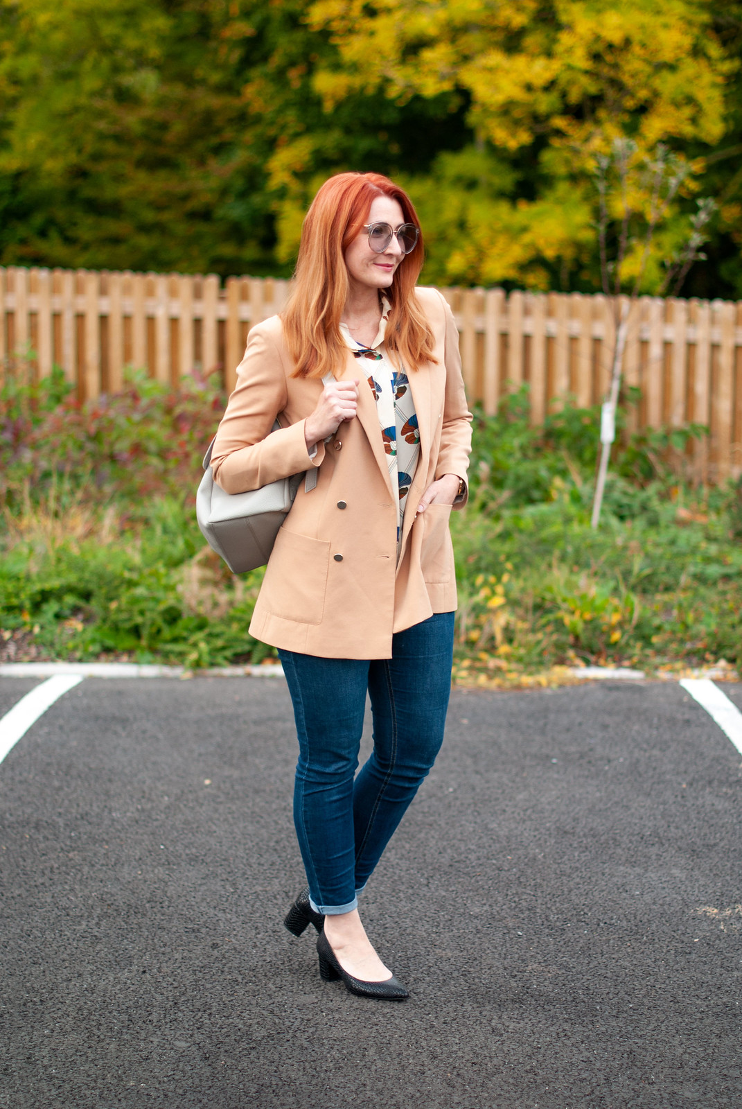 How to Make Jeans Smart for an Informal Meeting \ camel blazer \ dark wash skinny jeans \ patterned blouse \ block heel black shoes \ light grey backpack | Not Dressed As Lamb, over 40 style