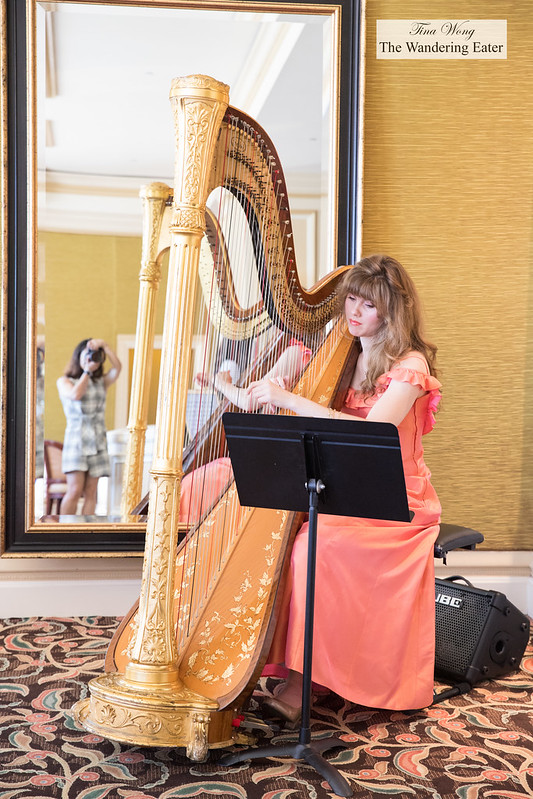 Harpist playing during afternoon tea
