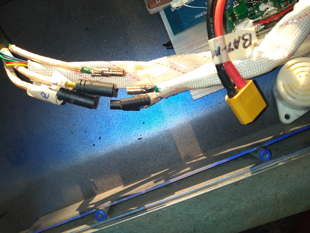 Overheated motor wire. Before and after removing melted plastic enclosure