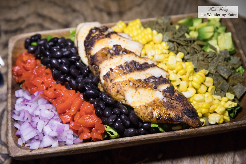 SXSW Salad - Spiced chicken breast, black beans, corn, roasted red bell peppers, avocado, serrano lime vinaigrette