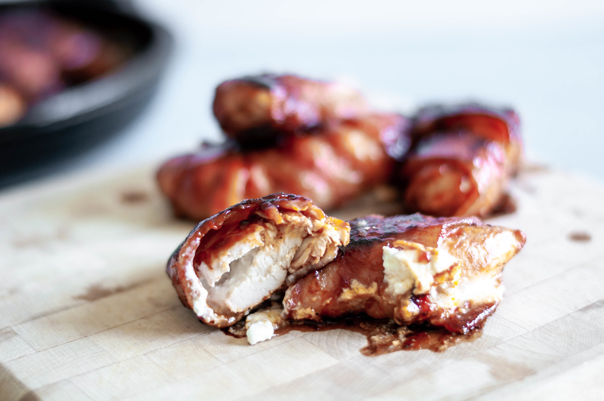 BBQ Bacon Wrapped Chicken smothered in barbecue sauce and stuffed with cream cheese makes the ultimate, flavorful dinner. Simple and delicious.