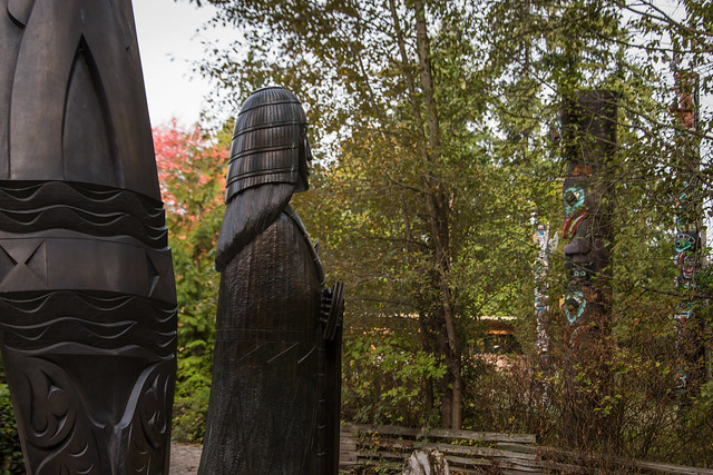 Portuguese Joe Statue near Totem Poles in Stanley Park