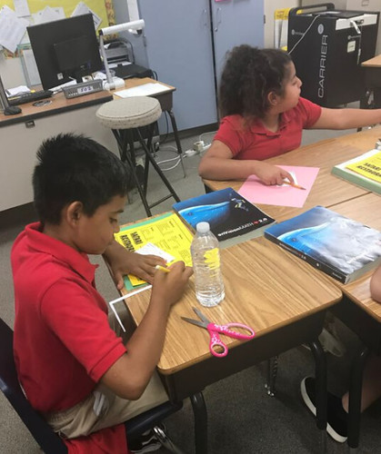 kids work with new math learning materials