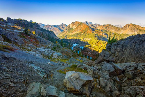 rampartridge rampartlakes trail mountainpeaks alpinelakeswilderness boulders lakes sunset