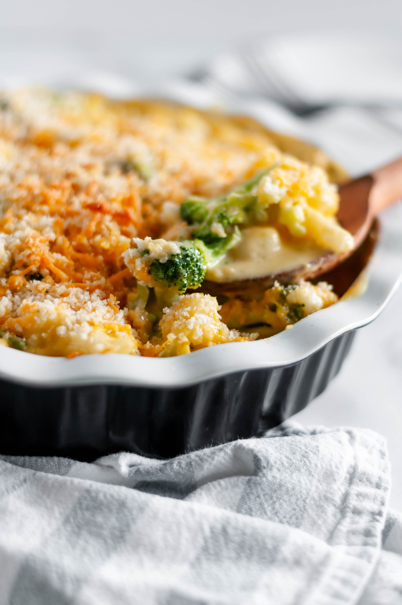 Broccoli and Cauliflower Au Gratin is a favorite side dish for every holiday. Rich, homemade cheese sauce, broccoli and cauliflower with a crispy panko topping.