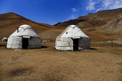 kyrgyzstan yurt yurts tash rabat camp blue sky steppe land kyrgyz scenery landscape